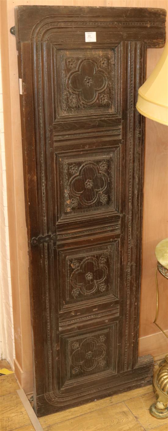 A carved oak panel, W.160cm